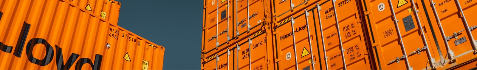 Orange shipping crates stacked